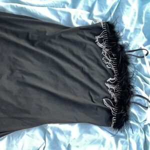 Black mini dress with rhinestones fringe & boa trim, perfect for a night out
